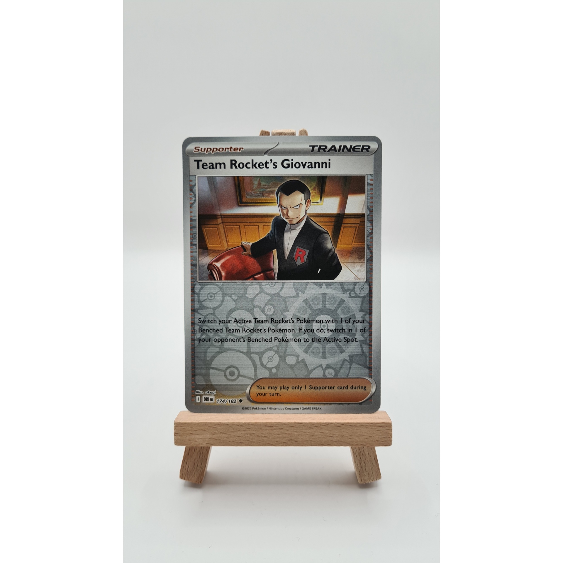 Team Rocket's Giovanni (DRI 174) Reverse Holo